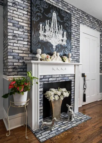 a kitchen with a sink window and cabinets