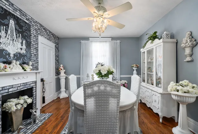 a kitchen with a sink a stove and cabinets