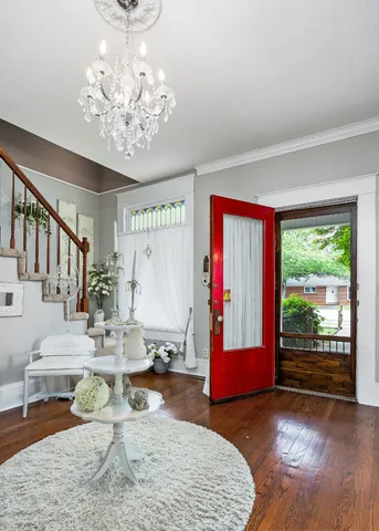 a view of dining room with furniture and wooden floor