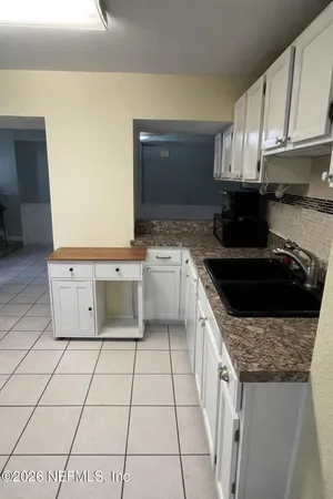 a bathroom with a toilet and a sink