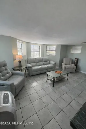 a bathroom with a shower and a toilet