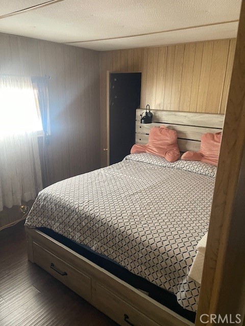 1560 Massachusetts Avenue, Unit 123 Riverside, CA 92507 - Photo 11 of 15 a bedroom with a bed and a window