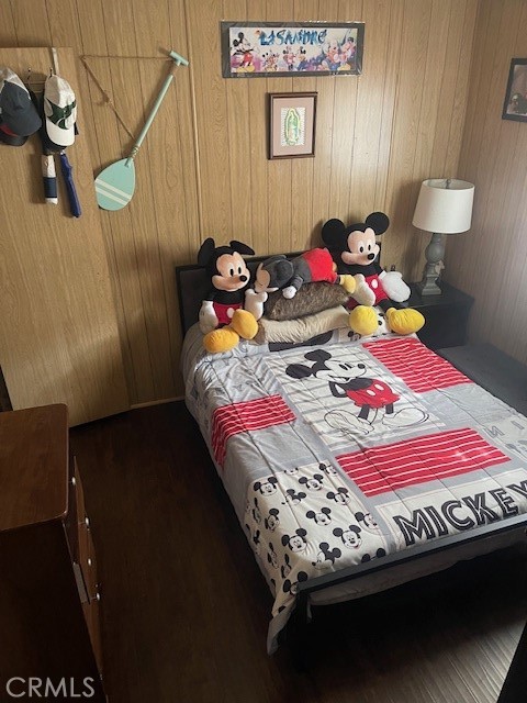 1560 Massachusetts Avenue, Unit 123 Riverside, CA 92507 - Photo 12 of 15 a bedroom with a bed and a dresser