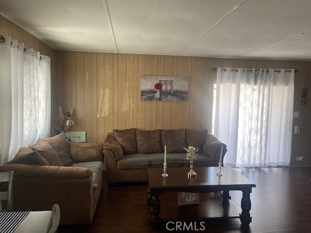 1560 Massachusetts Avenue, Unit 123 Riverside, CA 92507 - Photo 14 of 15 a living room with furniture and a window