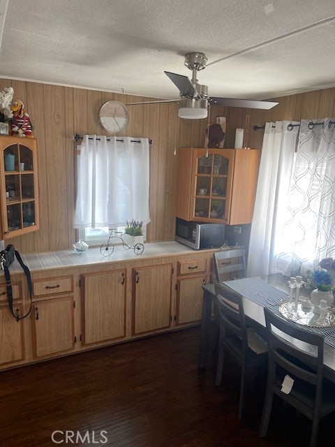 1560 Massachusetts Avenue, Unit 123 Riverside, CA 92507 - Photo 15 of 15 a kitchen with a sink cabinets and window