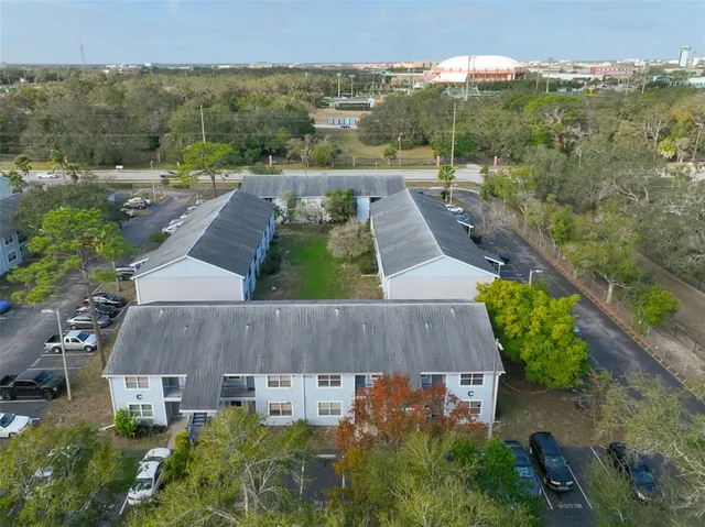 an aerial view of a house with a garden