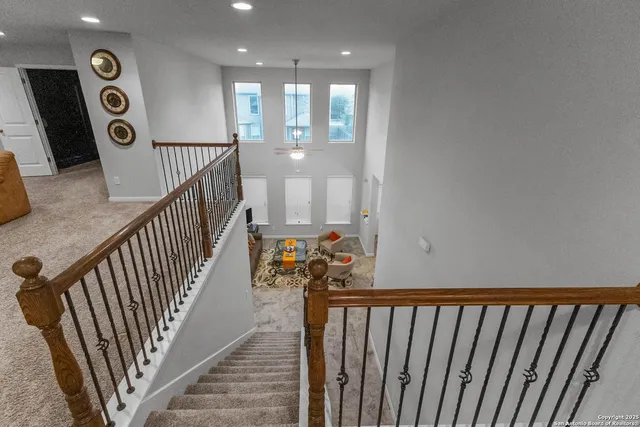 a view of hallway with stairs