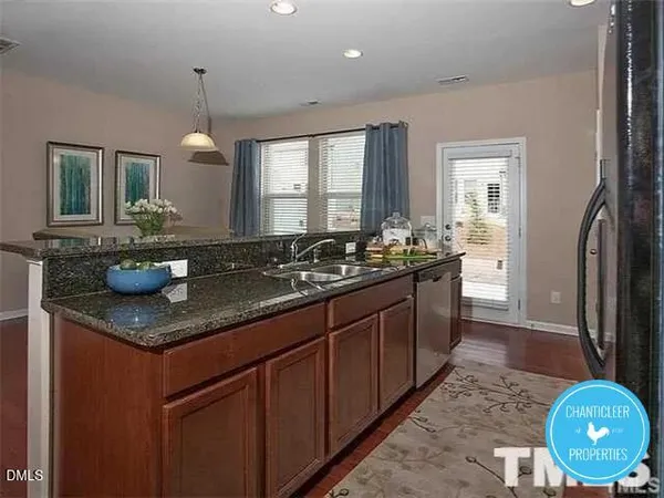 a kitchen with lots of counter space and a sink