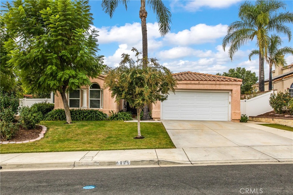 6990 Highland Spring Lane Highland, CA 92346 - Photo 1 of 1 a small garden in the middle of a house