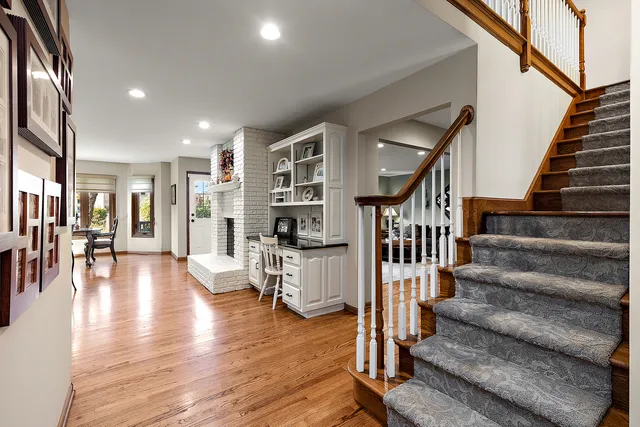 a kitchen with a table and chairs in it