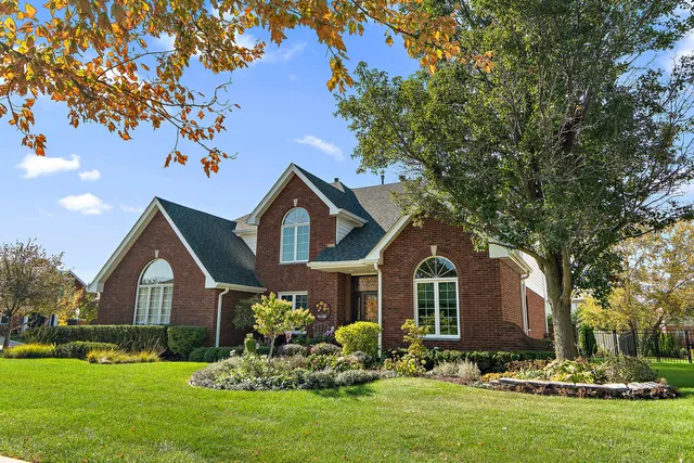 a view of an entryway with wooden floor and stairs