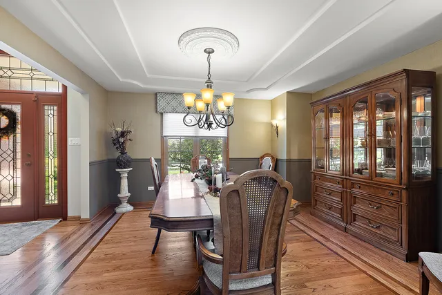 a livingroom with workspace and a window