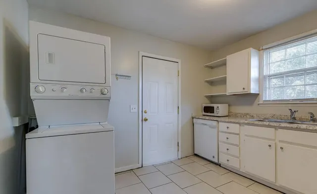 a view of a storage & utility room with washer and dryer