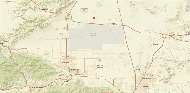 a white bed in a bathroom