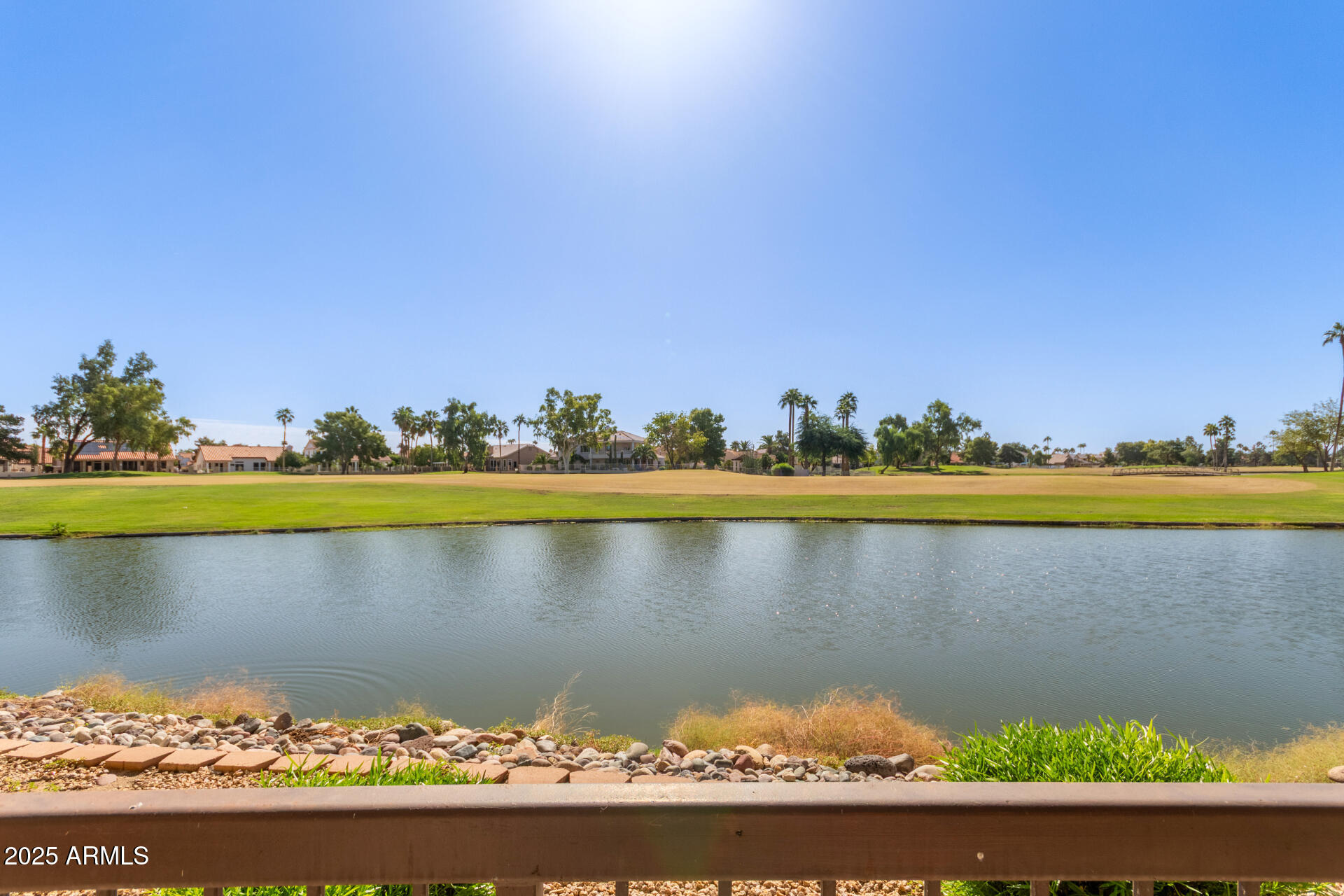 7101 West Beardsley Road, Unit 451 Glendale, AZ 85308 - Photo 1 of 26 a view of a lake with a lake