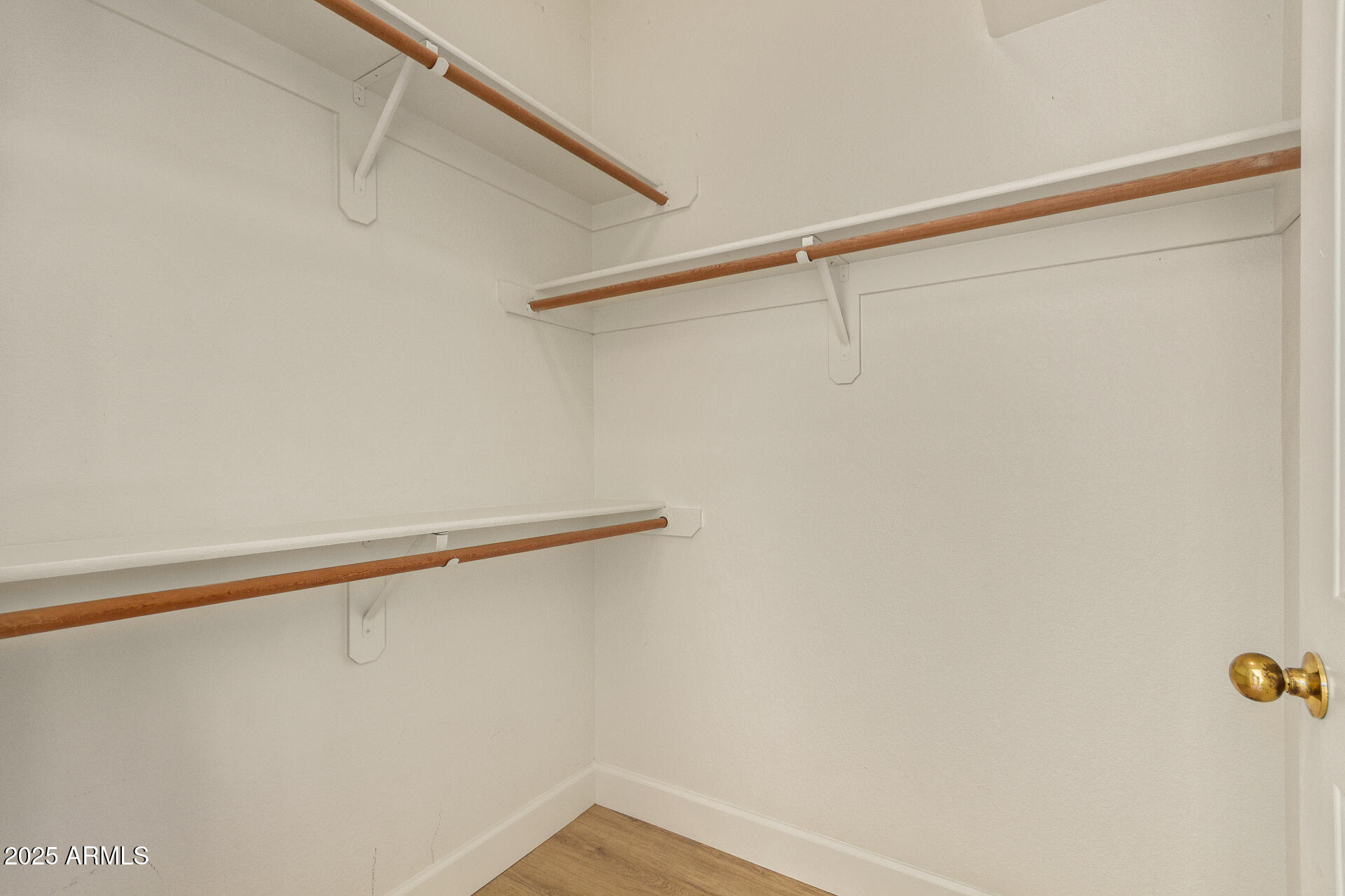 7101 West Beardsley Road, Unit 451 Glendale, AZ 85308 - Photo 12 of 26 a view of a room with racks on the wall