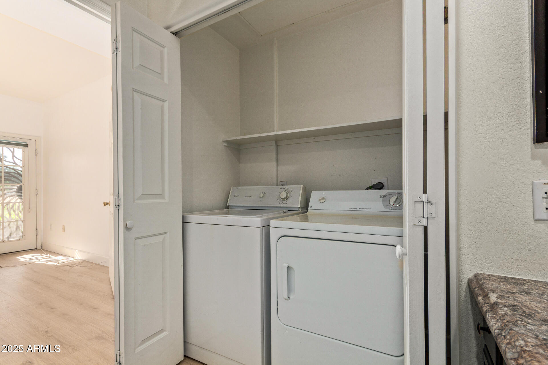 7101 West Beardsley Road, Unit 451 Glendale, AZ 85308 - Photo 13 of 26 a utility room with dryer and washer