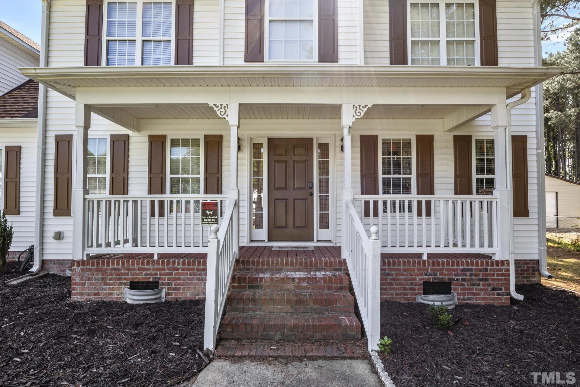 117 Mendel Drive Smithfield, NC 27577 - Photo 3 of 39 front view of a house with a porch
