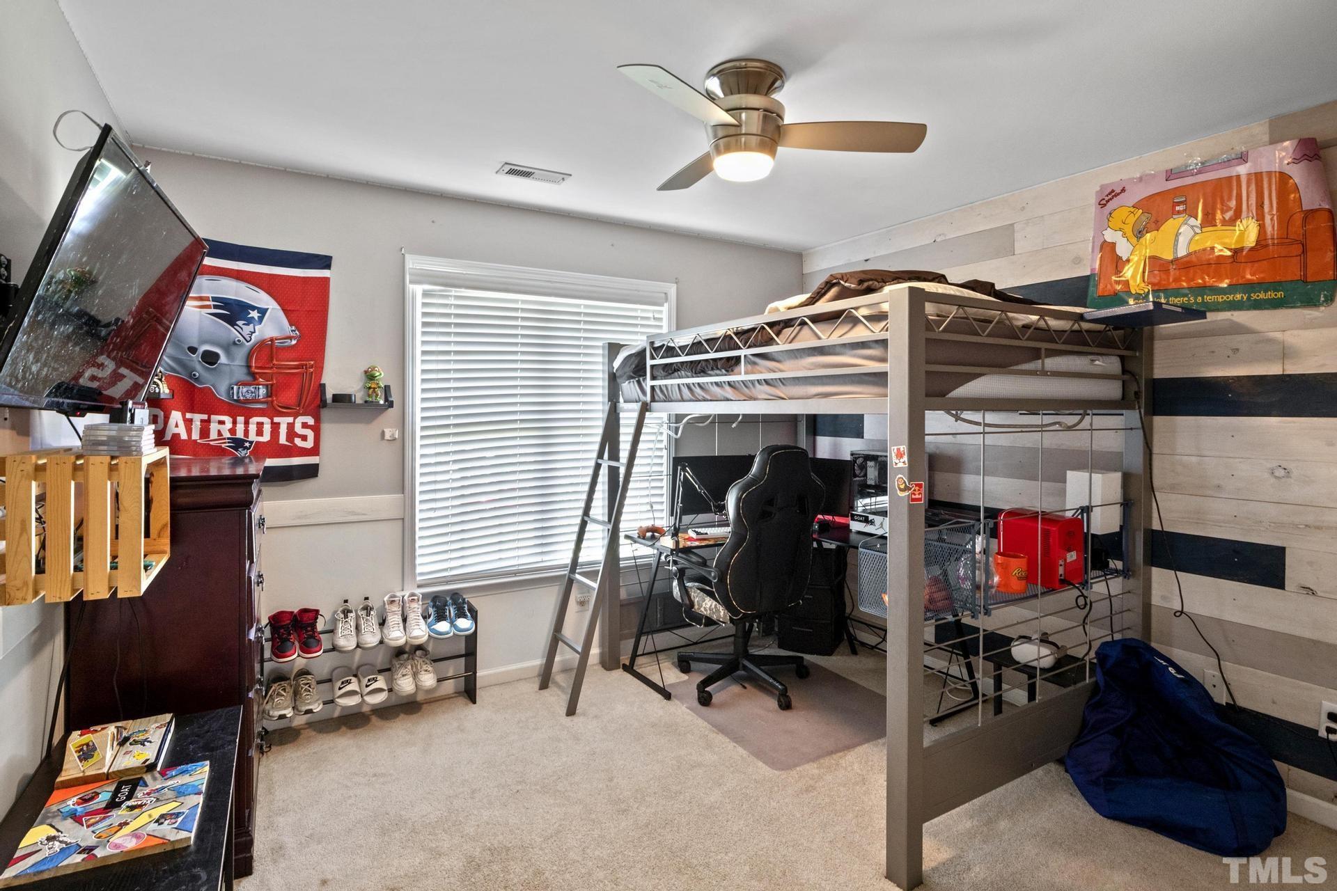 117 Mendel Drive Smithfield, NC 27577 - Photo 31 of 39 a view of a room with gym equipment