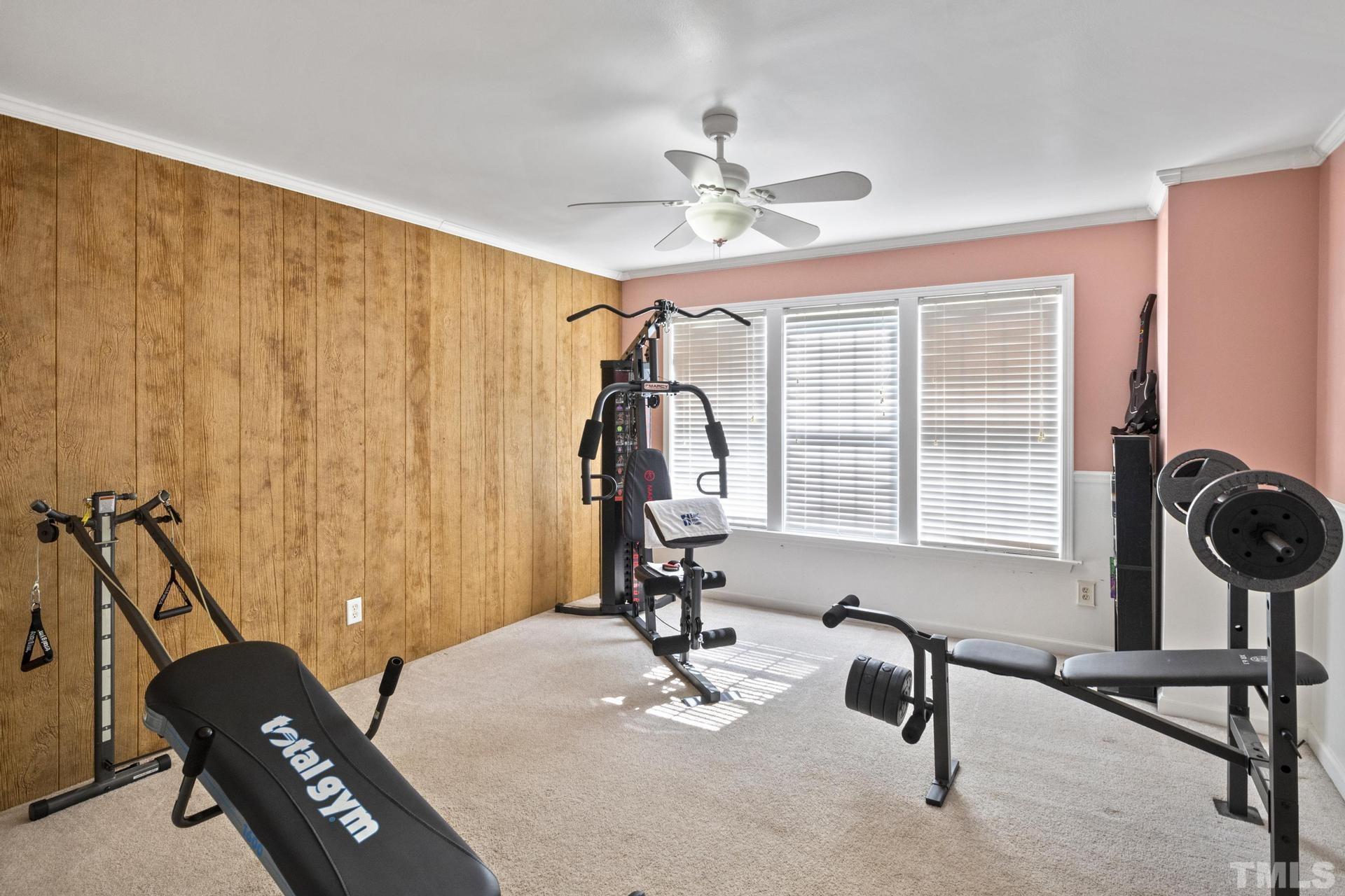 117 Mendel Drive Smithfield, NC 27577 - Photo 35 of 39 a view of a room with gym equipment