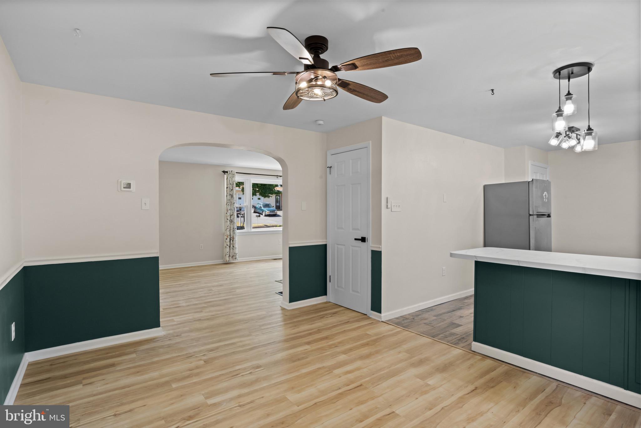 14 Sharon Road Enola, PA 17025 - Photo 10 of 40 Open-concept living area featuring wood-finish flo