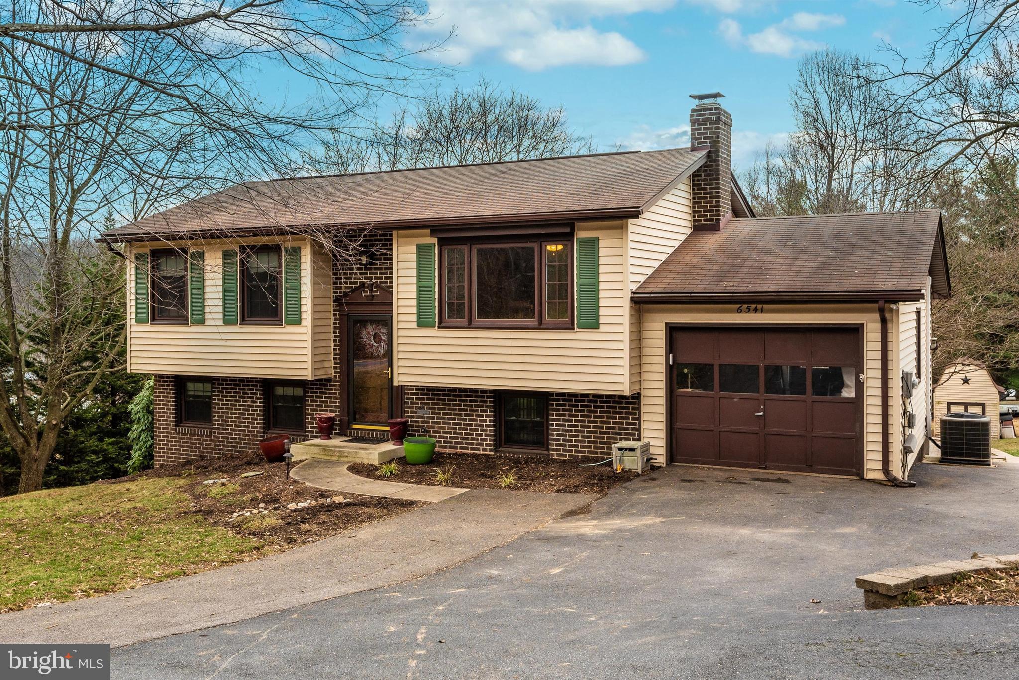 6541 South Clifton Road Frederick, MD 21703 - Photo 47 of 50 Front view Garage with driveway parking