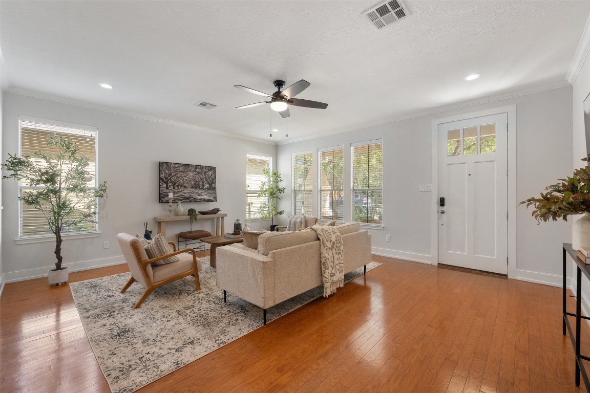 6020 Rutledge Lane Austin, TX 78745 - Photo 16 of 40 a living room with furniture and a large window