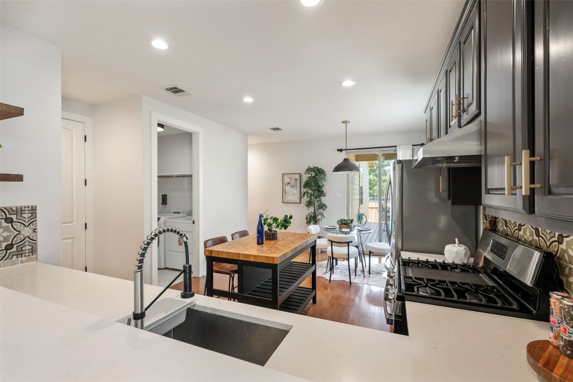6020 Rutledge Lane Austin, TX 78745 - Photo 18 of 40 a living room with furniture and a flat screen tv