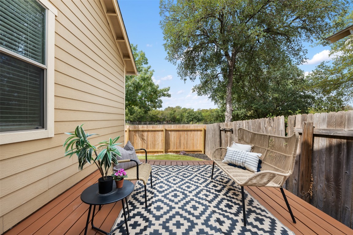 6020 Rutledge Lane Austin, TX 78745 - Photo 35 of 40 a view of balcony with wooden floor and outdoor seating