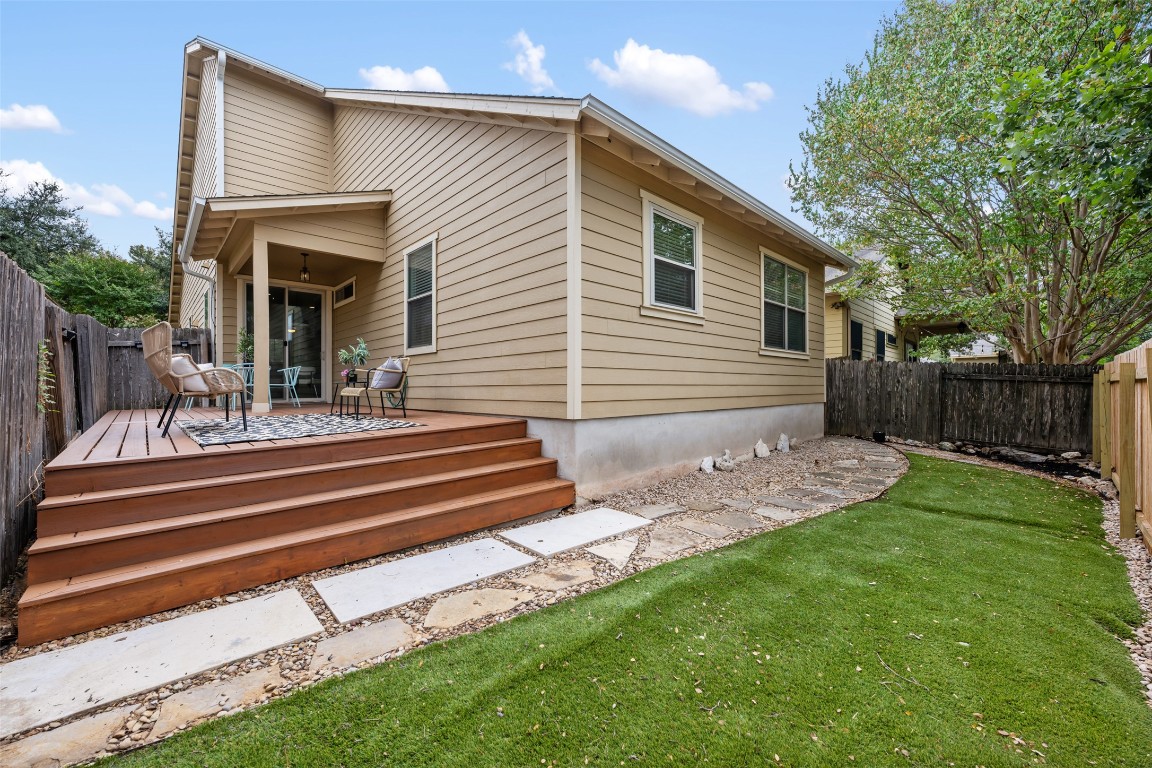 6020 Rutledge Lane Austin, TX 78745 - Photo 37 of 40 a view of a house with backyard and a garden