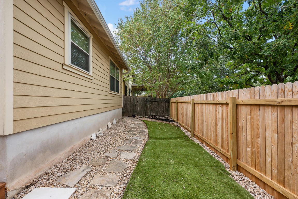 6020 Rutledge Lane Austin, TX 78745 - Photo 38 of 40 a view of a backyard with pathway