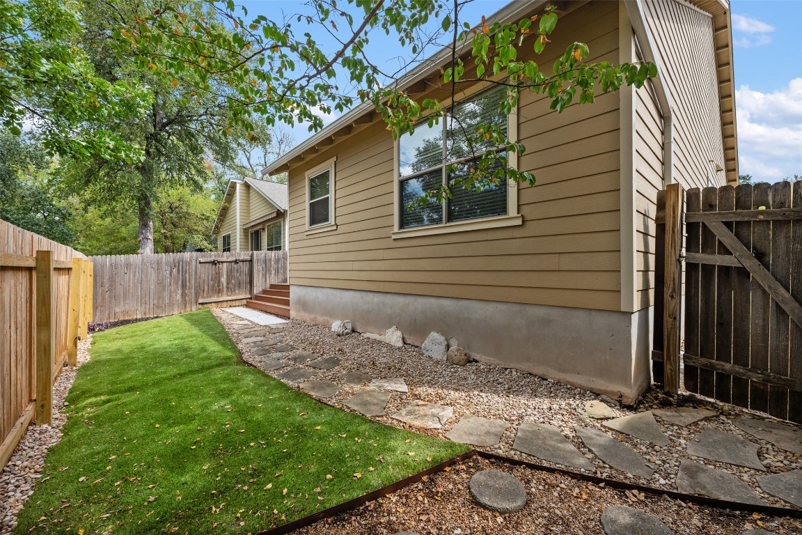 6020 Rutledge Lane Austin, TX 78745 - Photo 39 of 40 a view of a backyard with a tree