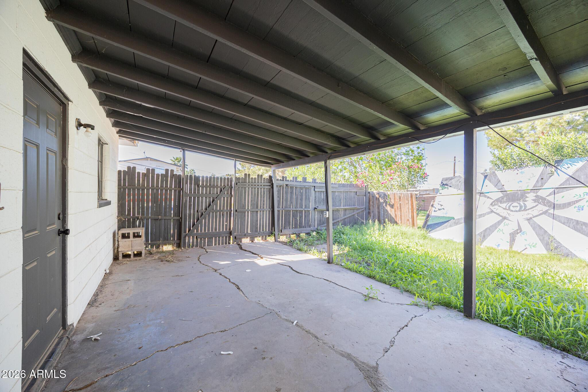 414 West 13th Street Tempe, AZ 85281 - Photo 20 of 21 a backyard of a house with garden and outdoor seating