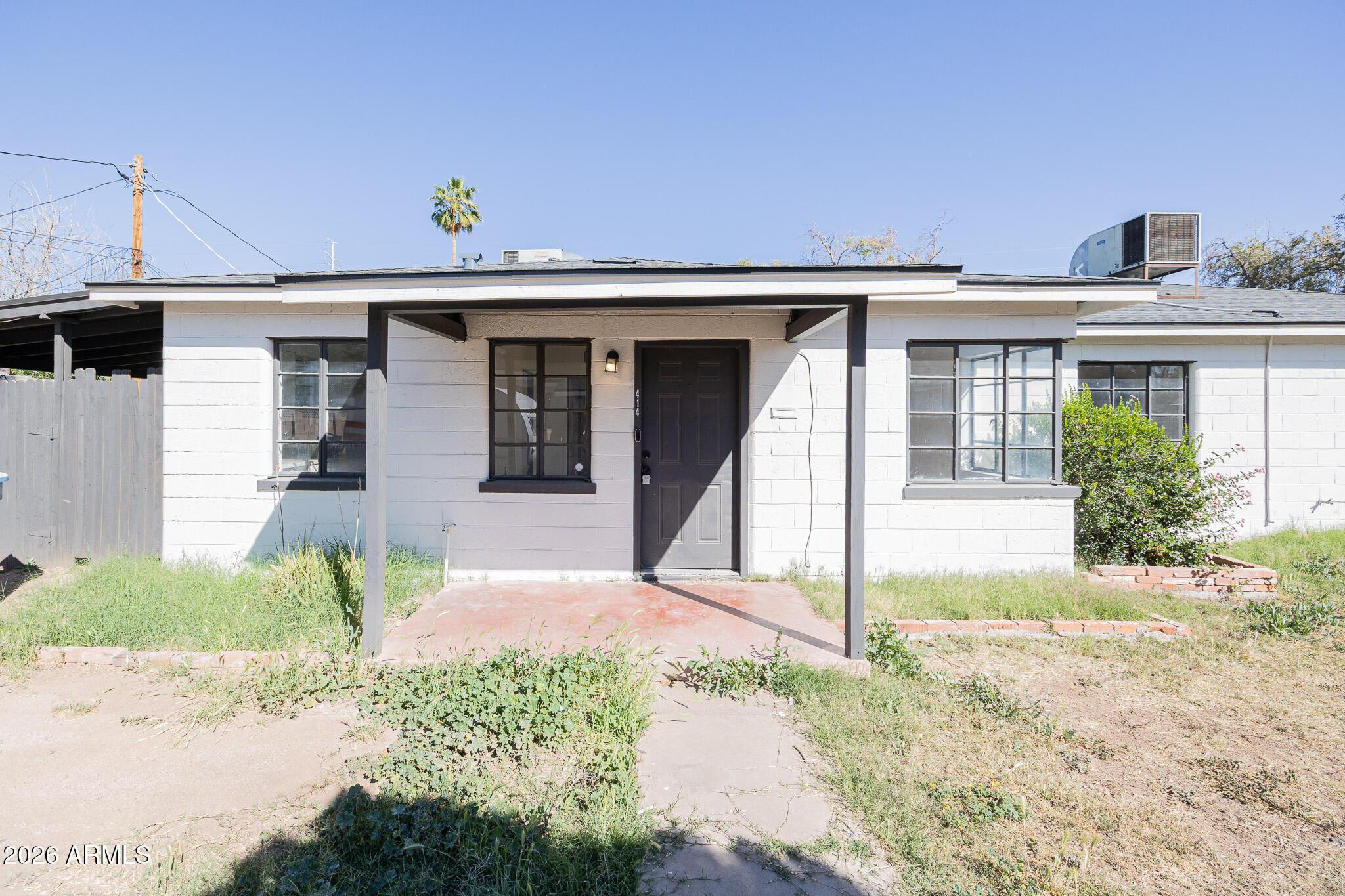 414 West 13th Street Tempe, AZ 85281 - Photo 2 of 21 a front view of a house with a porch