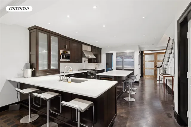 a view of a dining room with furniture and window