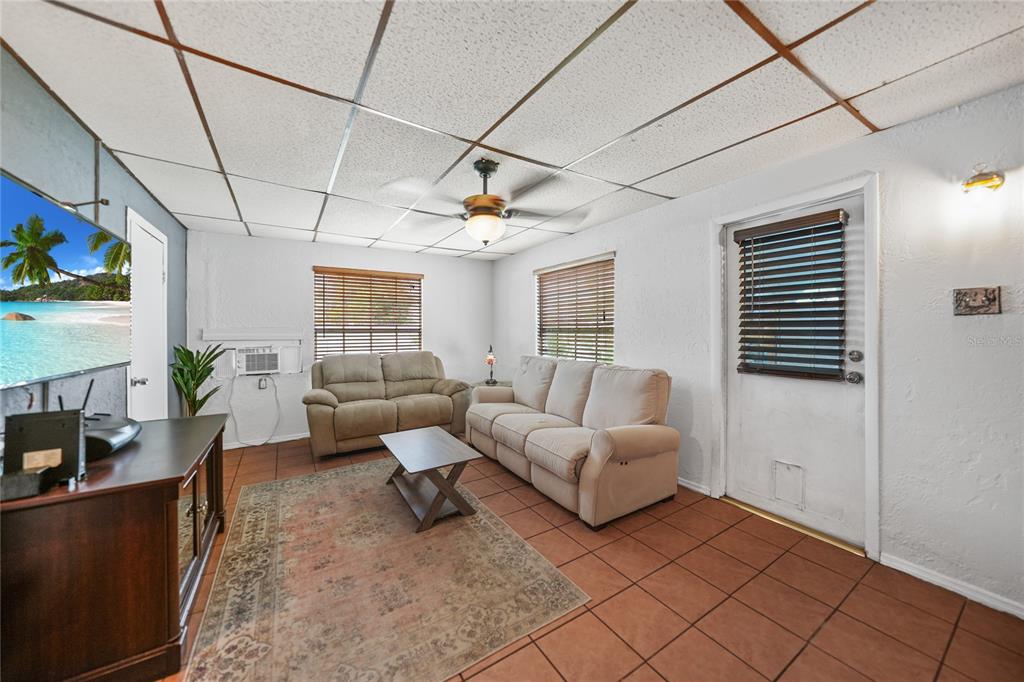 2321 Dallas Street Port Charlotte, FL 33952 - Photo 15 of 38 a living room with furniture and a window