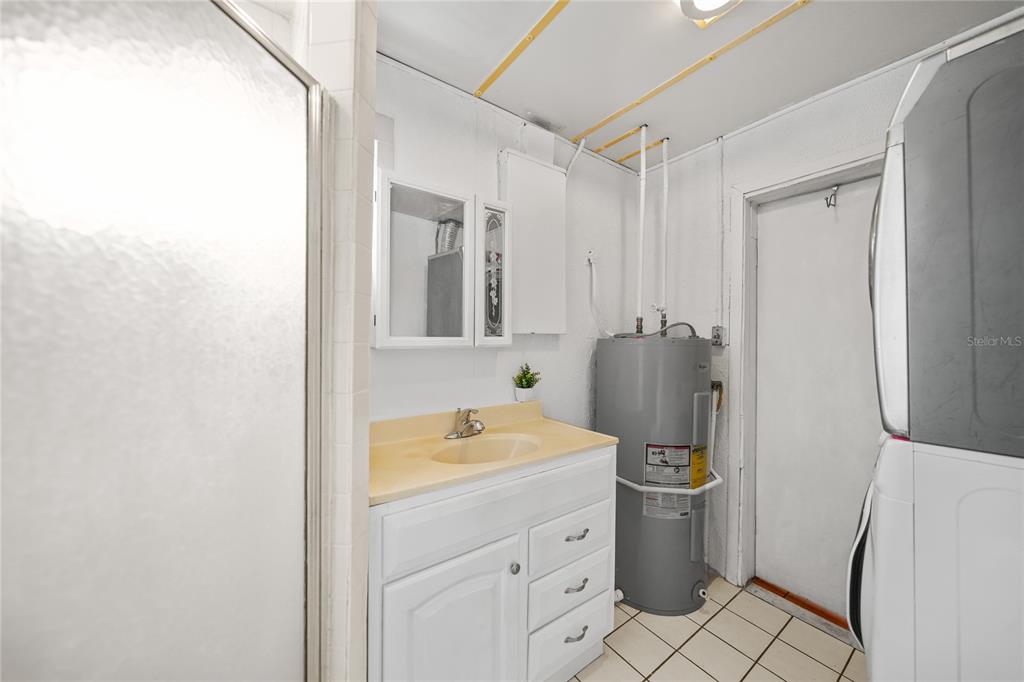 2321 Dallas Street Port Charlotte, FL 33952 - Photo 25 of 38 a bathroom with a sink toilet and shower