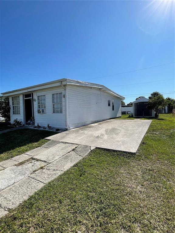 2321 Dallas Street Port Charlotte, FL 33952 - Photo 31 of 38 a view of a backyard of the house