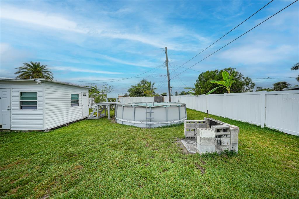 2321 Dallas Street Port Charlotte, FL 33952 - Photo 32 of 38 a house view with a garden and deck