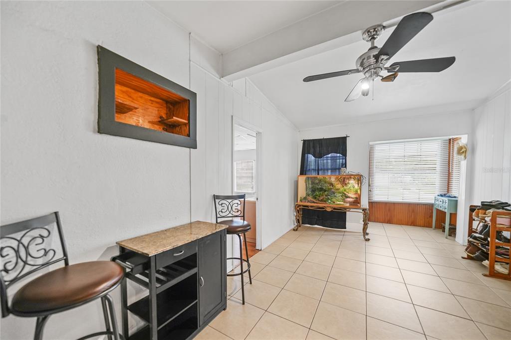 2321 Dallas Street Port Charlotte, FL 33952 - Photo 6 of 38 a view of a livingroom with furniture and a ceiling fan