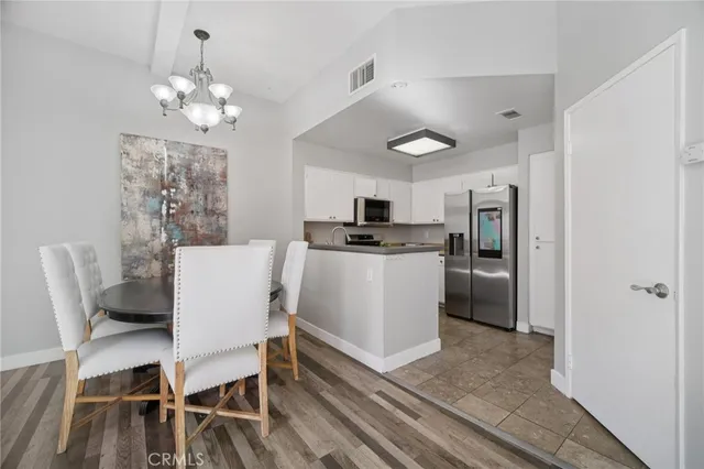 a kitchen with a stove and a sink