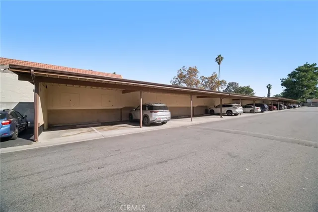 a view of a swimming pool with a yard