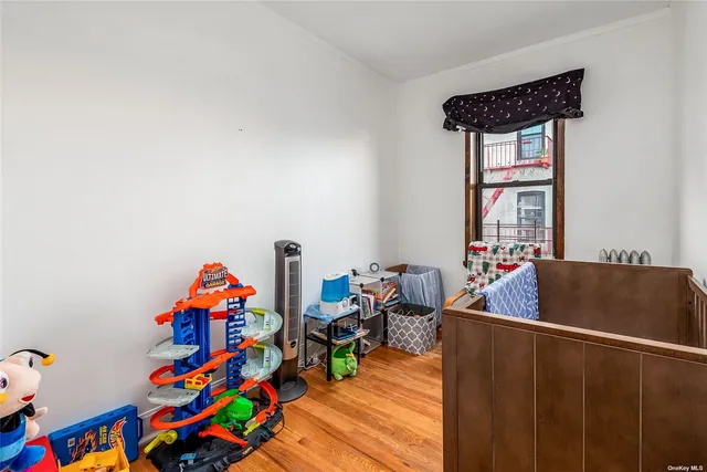 a living room with baby toys