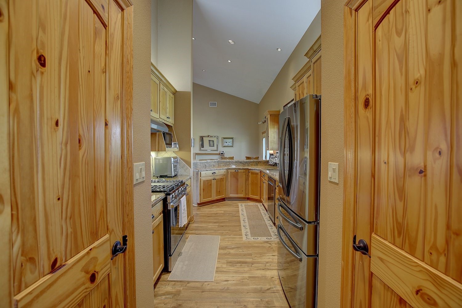 9414 Laird Road Round Top, TX 78954 - Photo 28 of 50 View form the utility room to the Kitchen area via a pocket door entry transition
