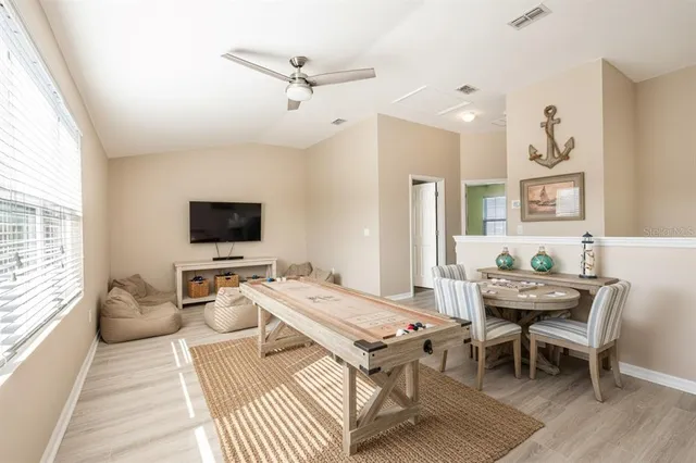 a bathroom with a sink toilet tub and shower