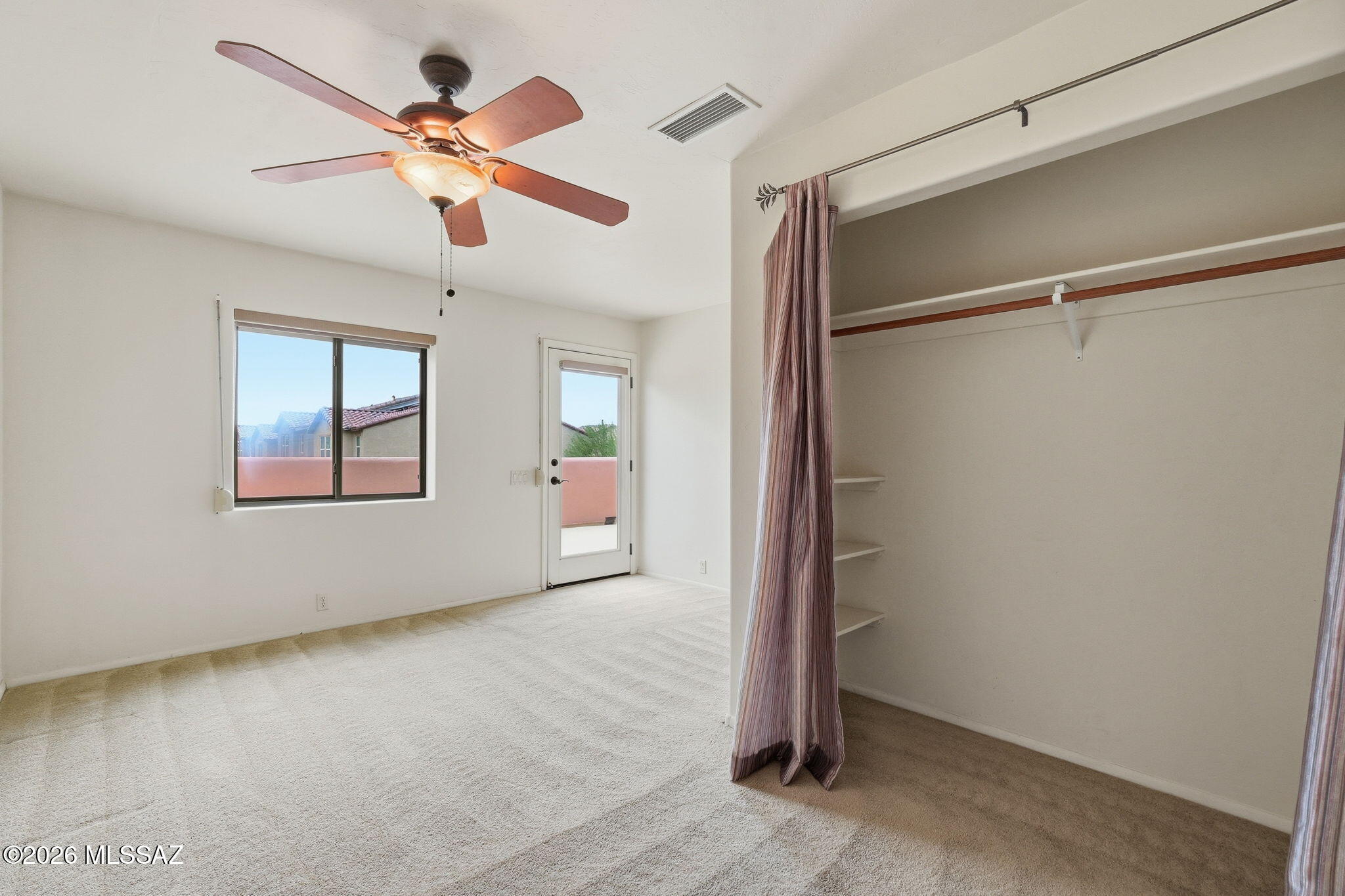 1125 East Kleindale Road Tucson, AZ 85719 - Photo 44 of 49 a view of an empty room with a window