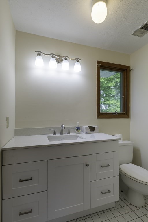 735 North Poland Road Conway, MA 01341 - Photo 11 of 40 a bathroom with a toilet sink and mirror