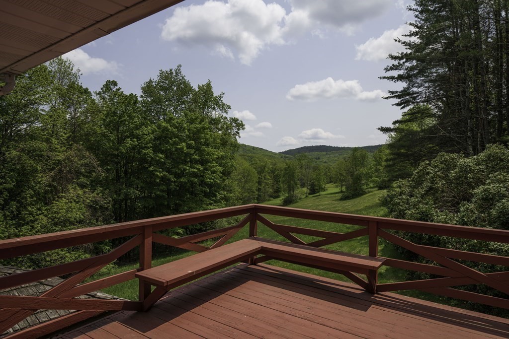 735 North Poland Road Conway, MA 01341 - Photo 3 of 40 a view of a balcony with wooden floor and fence