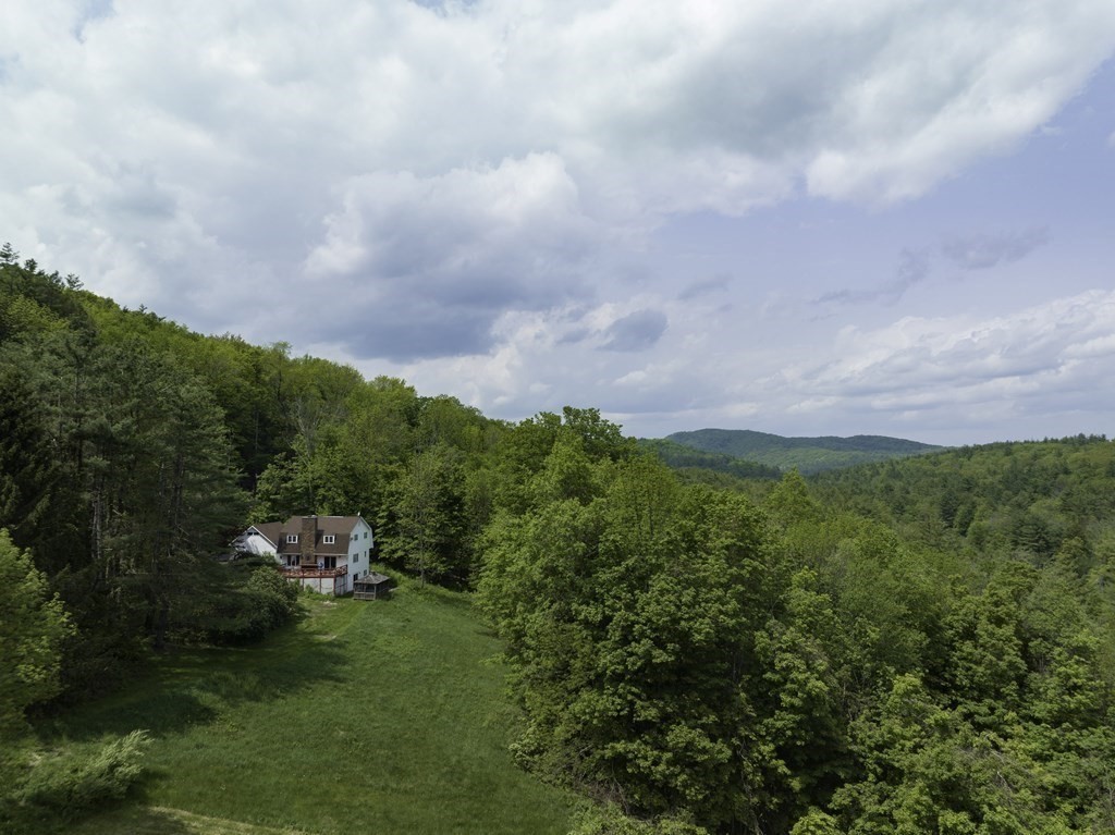 735 North Poland Road Conway, MA 01341 - Photo 32 of 40 a view of a city with lush green forest