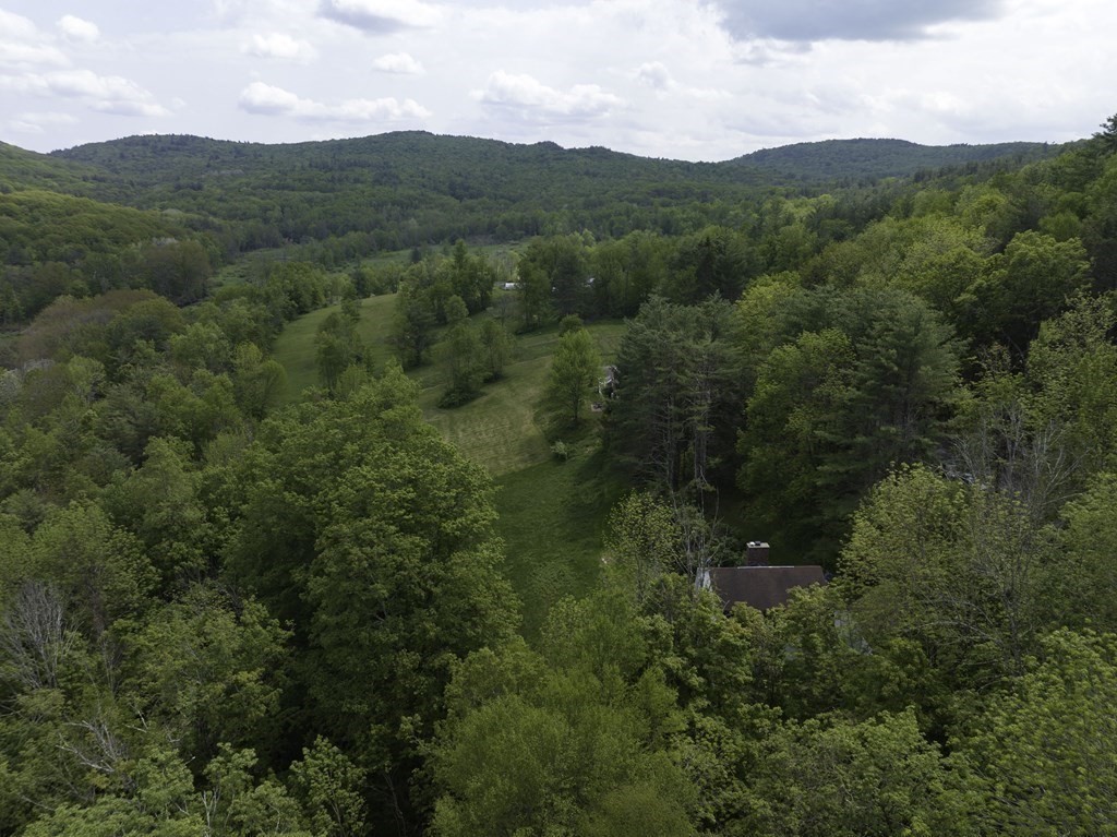 735 North Poland Road Conway, MA 01341 - Photo 35 of 40 a view of a mountain in the distance in a field